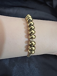 Çemberli model gold renk çelik bileklik