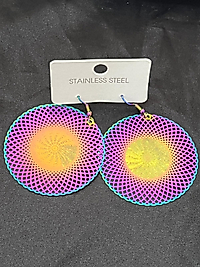 Yansımalı çelik küpe