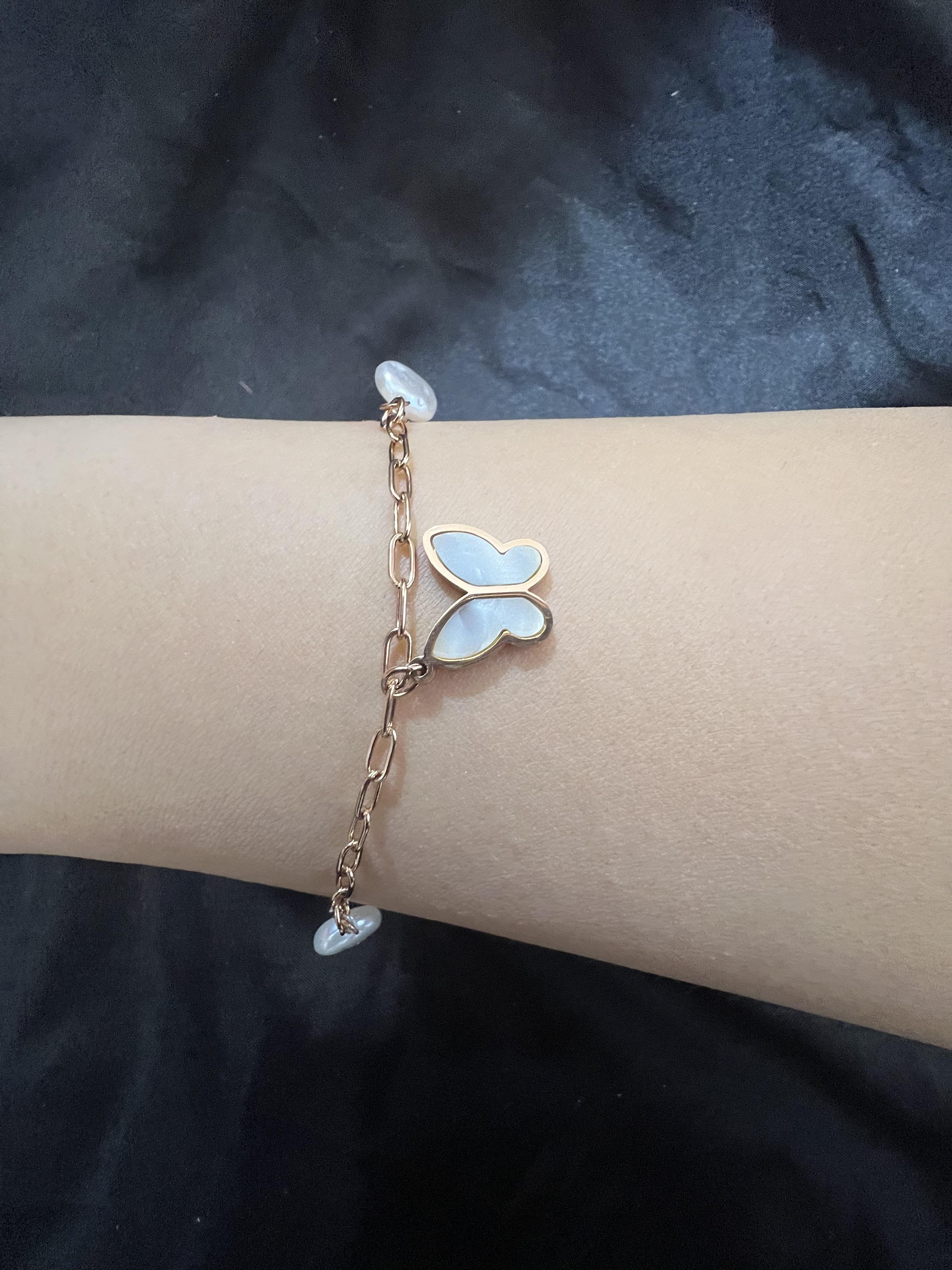 Beyaz boncuk detaylı kelebek model rose gold çelik bileklik