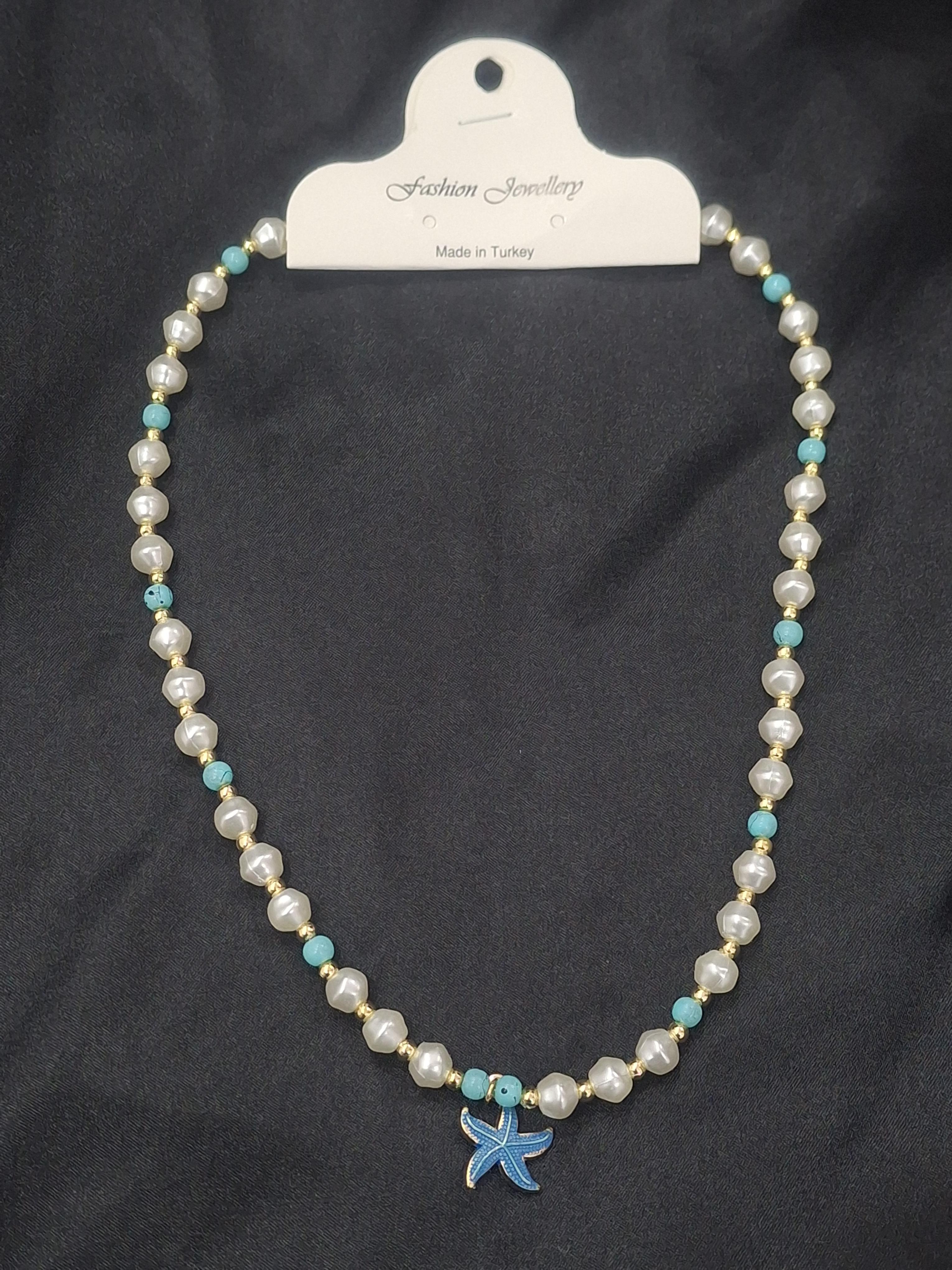 Deniz yıldızı model mavi boncuk detay yazlık kolye