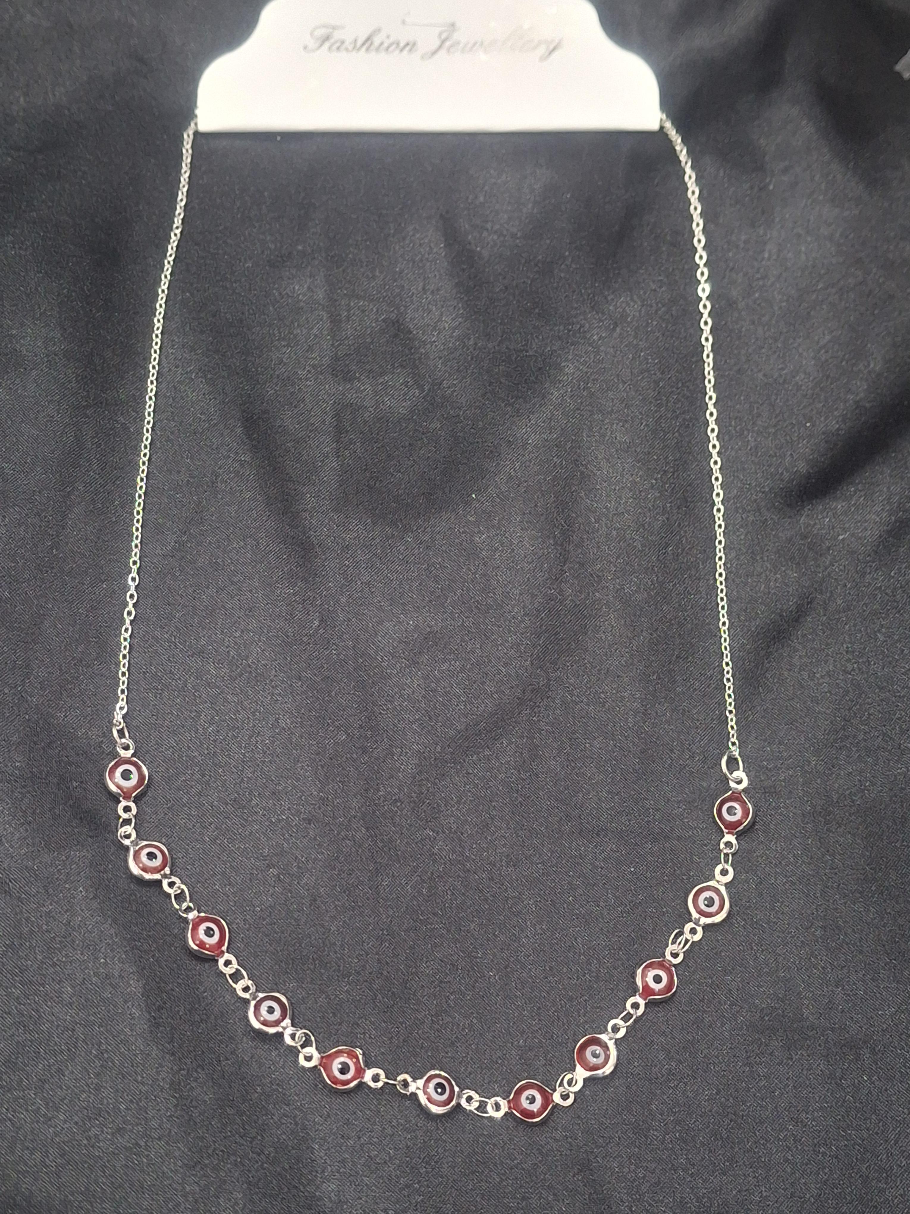 Kırmızı nazar boncuklu gümüş renk kolye