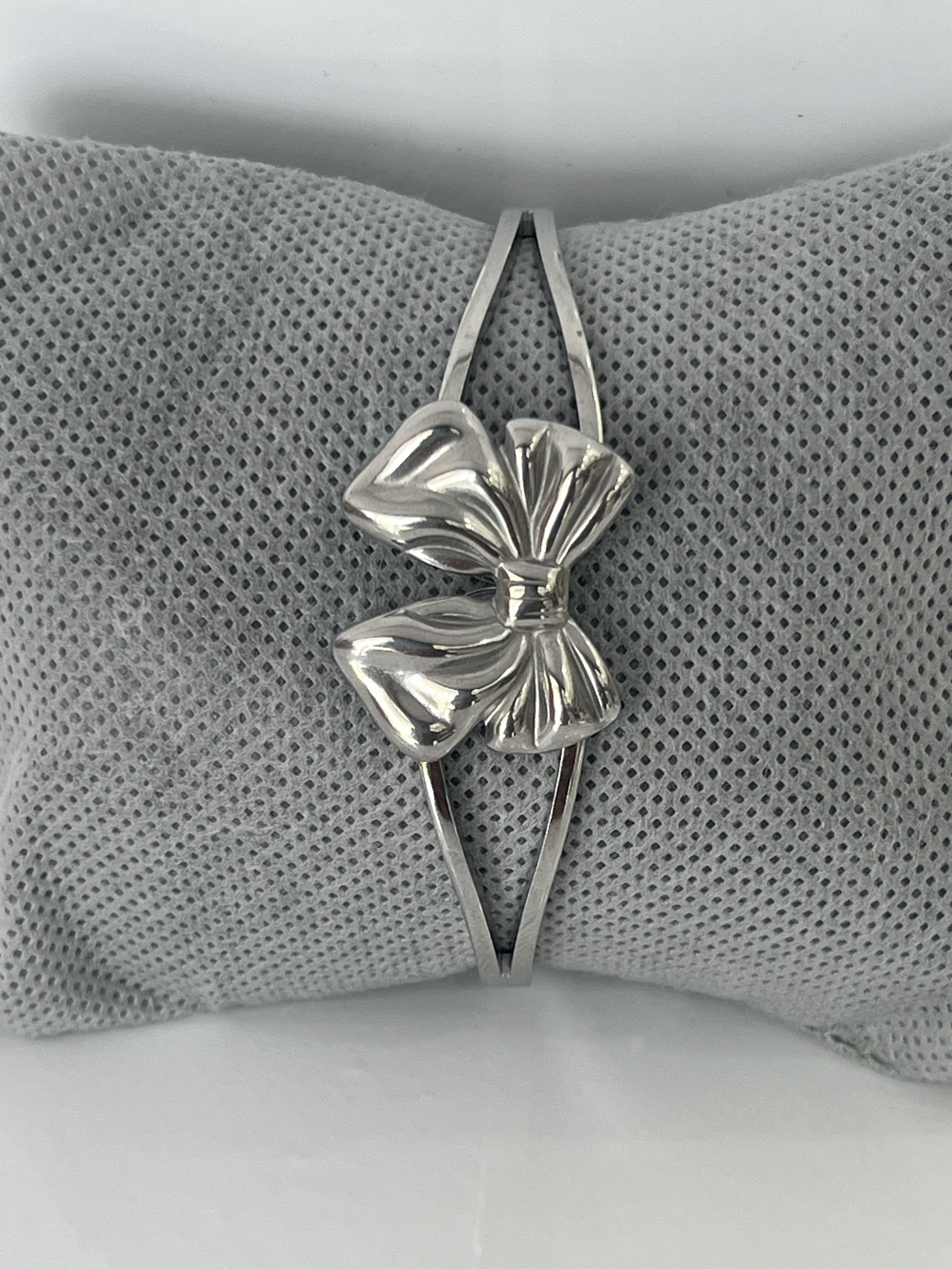 Kurdele model gümüş renk çelik kelepçe