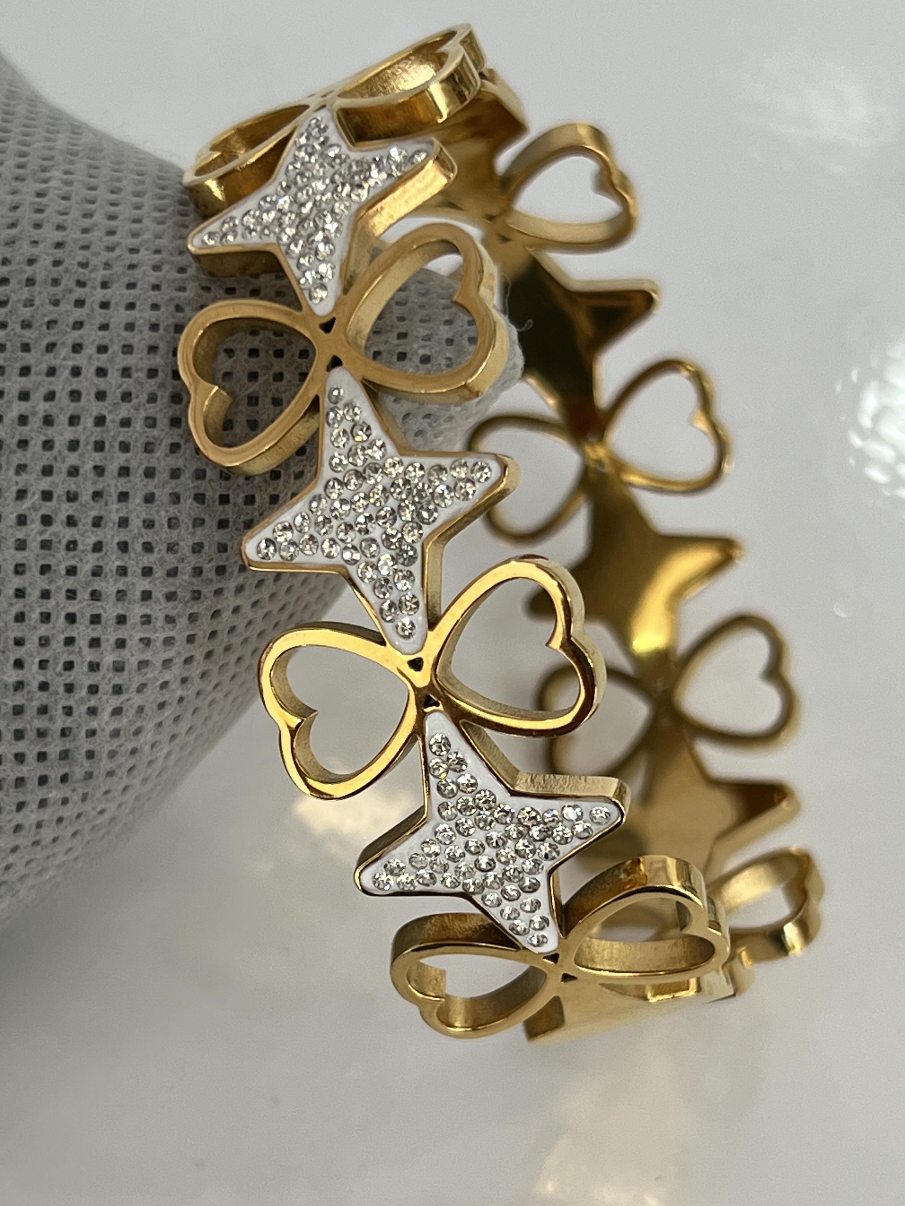 Kutup yıldızı ve kalp model gold çelik kelepçe