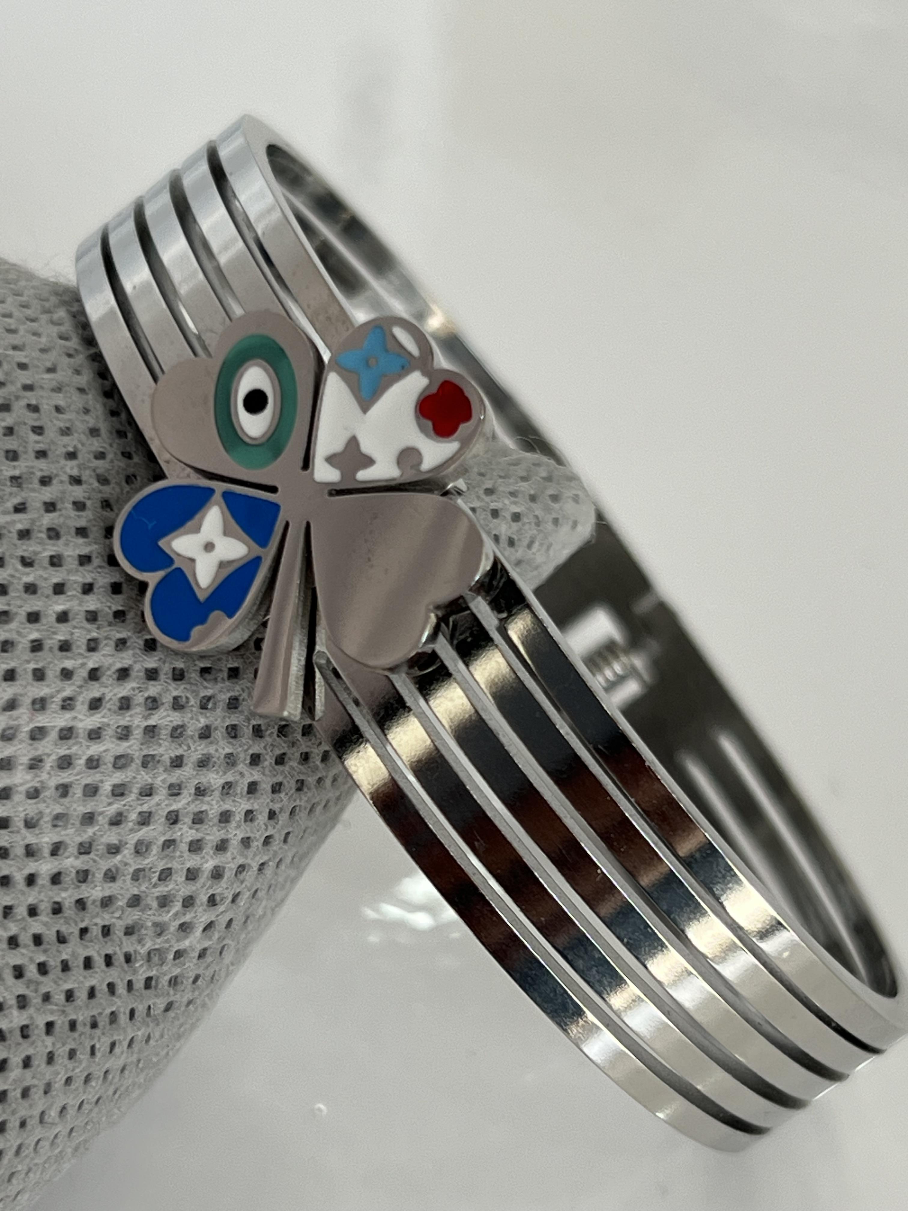 Yonca model gümüş renk çelik kelepçe